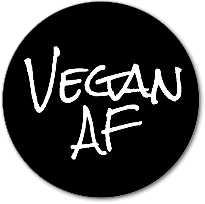 Vegan AF Premium Vinyl Die Cut Decal. It is a black circle with our white Vegan AF logo on it.